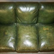 Victorian leather canapé, shield armrests, stamped Maple & Co.