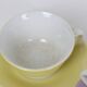 Duo of yellow and purple cups + vintage saucers
