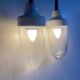 Pair of Art Deco wall lights in cast iron, glass and ceramic from the 1930s.