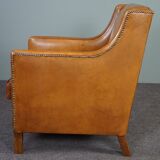 Modern charming armchair in sheepskin