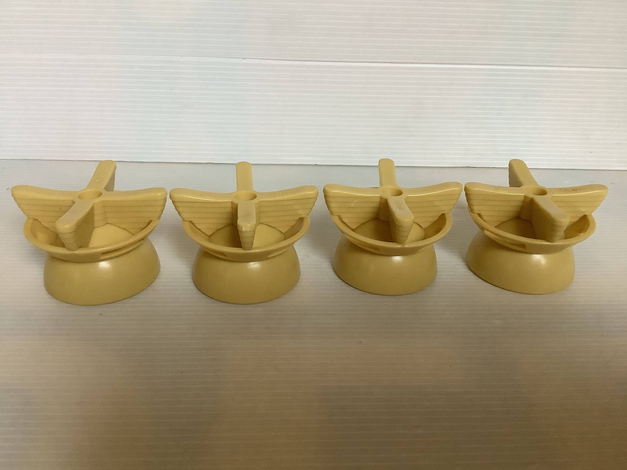 Quatre coquetiers rotatifs