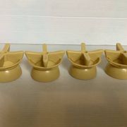 Quatre coquetiers rotatifs