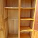 Vintage wardrobe with mirror and tapered legs.