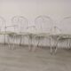 4 wrought iron garden armchairs