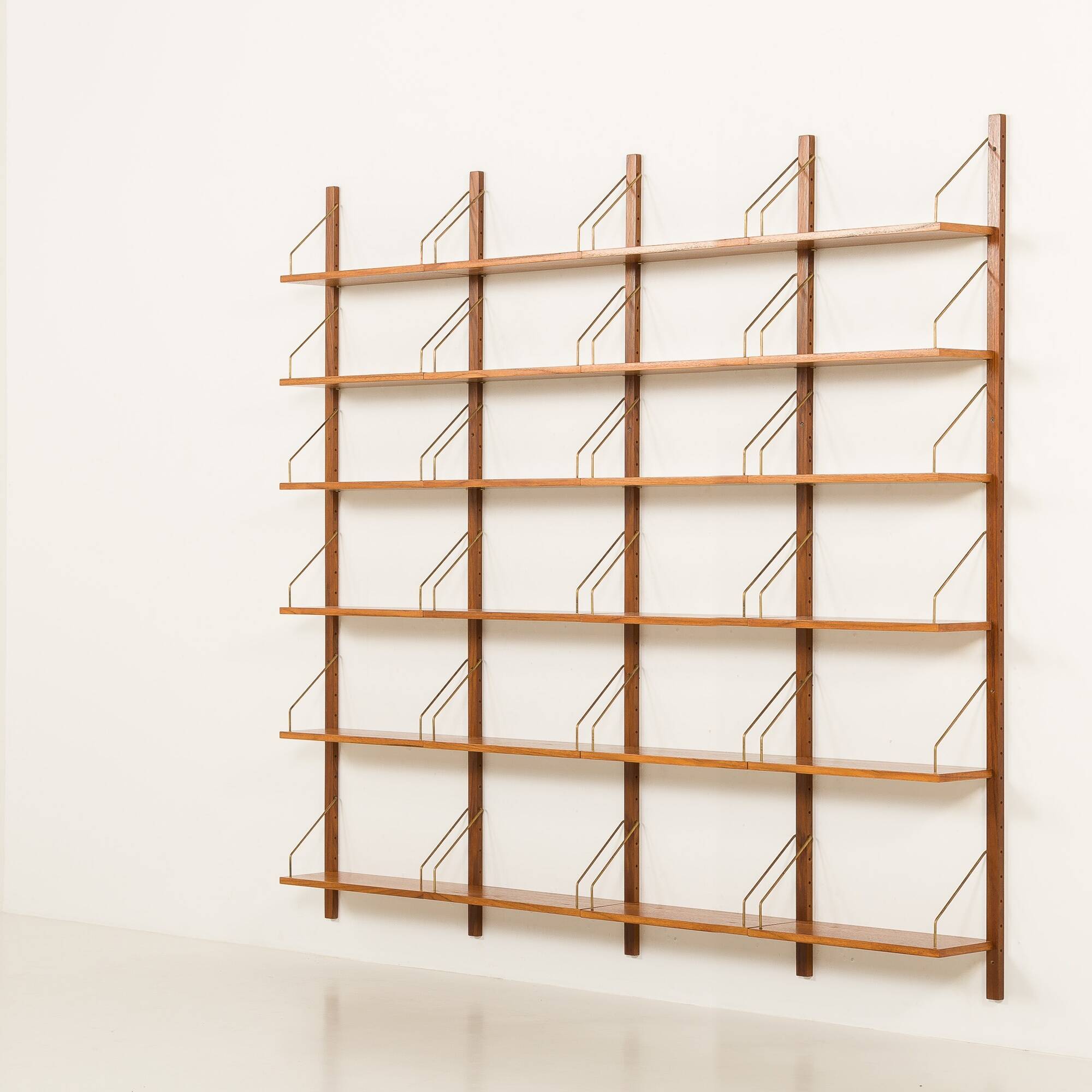 Danish teak 4 bay shelving unit in the style of Poul Cadovius, 1960s