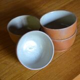 Lot of 4 bowls in sandstone and shiny grey inside