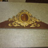 Old wooden pediment stucco