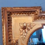 Large mirror XIX th in wood and gilded stucco Louis XVI style