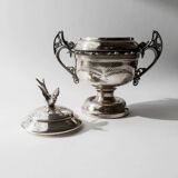 Vintage 1930s silver-plated footed bowl with lid by Warren Rogers New York, featuring a bird motif and ornate details.