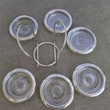 6 coasters and silver metal support