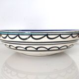 Large decorative dish with colorful peacock