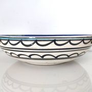 Large decorative dish with colorful peacock