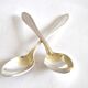 Set of 2 silver-plated teaspoons with a gold filigree design, 13.5 cm.