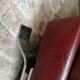 Couple de fauteuil en simili cuir rouge bordeaux, annees 70