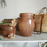 Old terracotta pot with lid