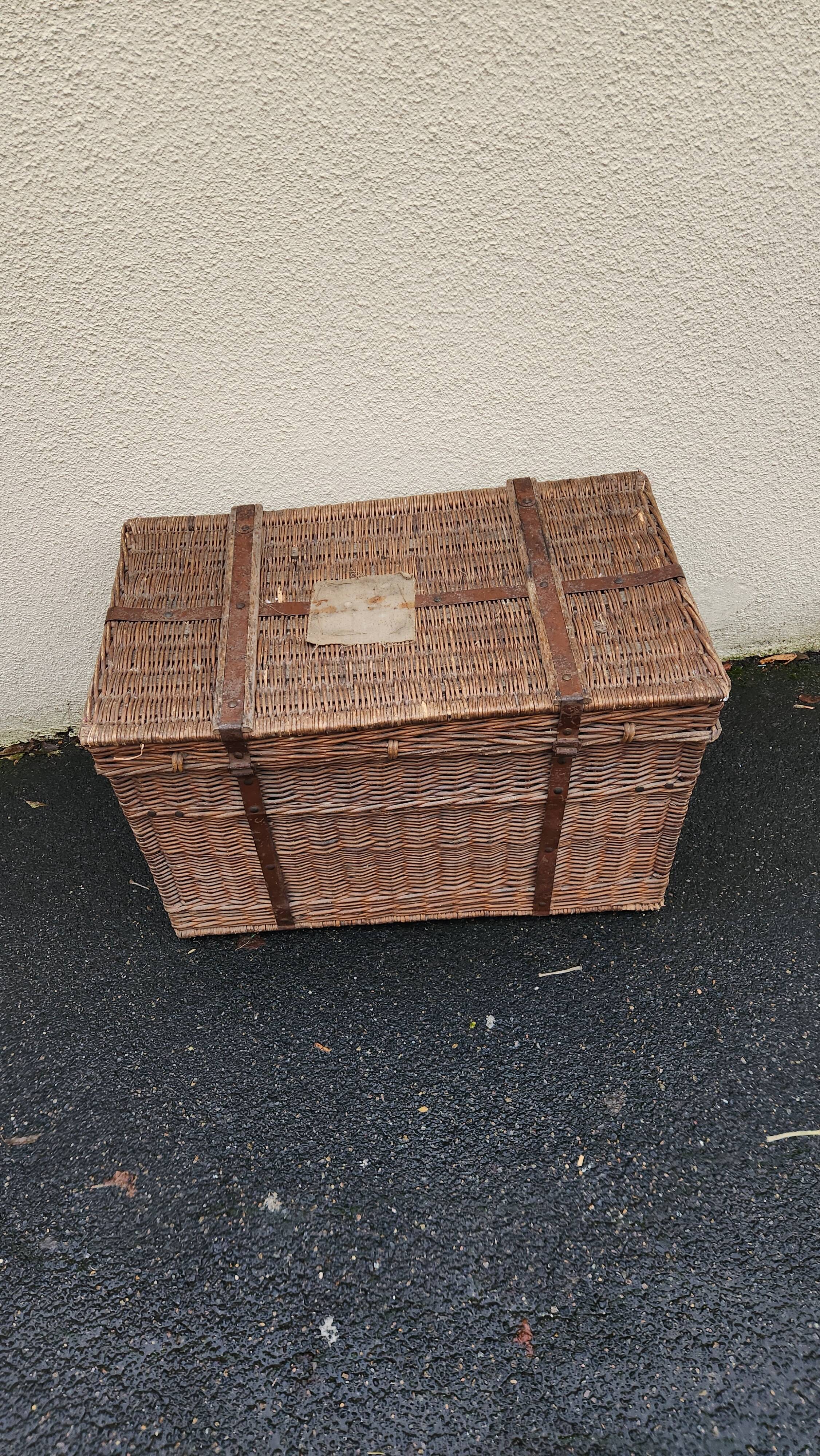 Antique vintage rattan and wicker travel trunk from the 1900s