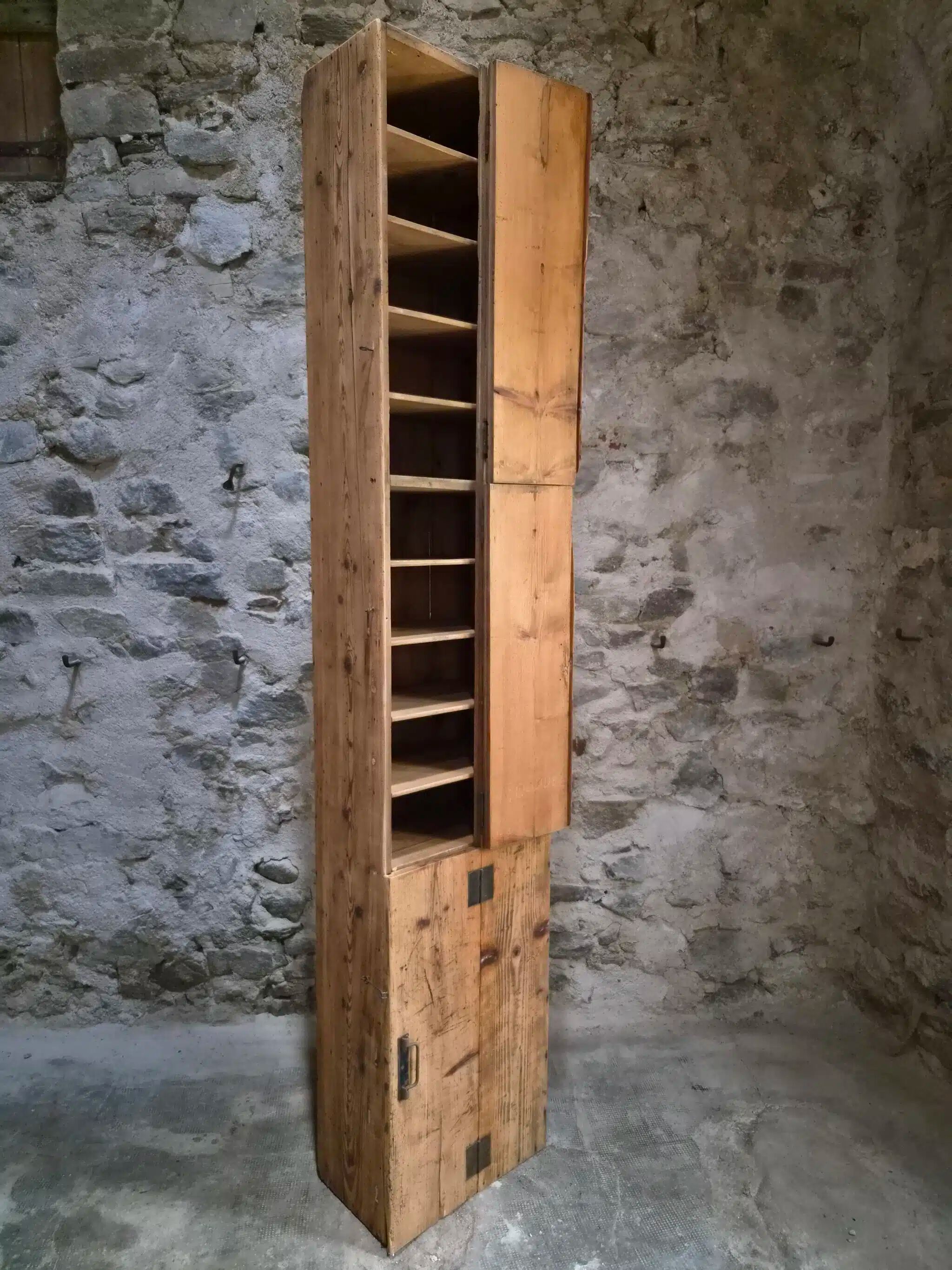 Antique French workshop cabinet in pine with compartments.