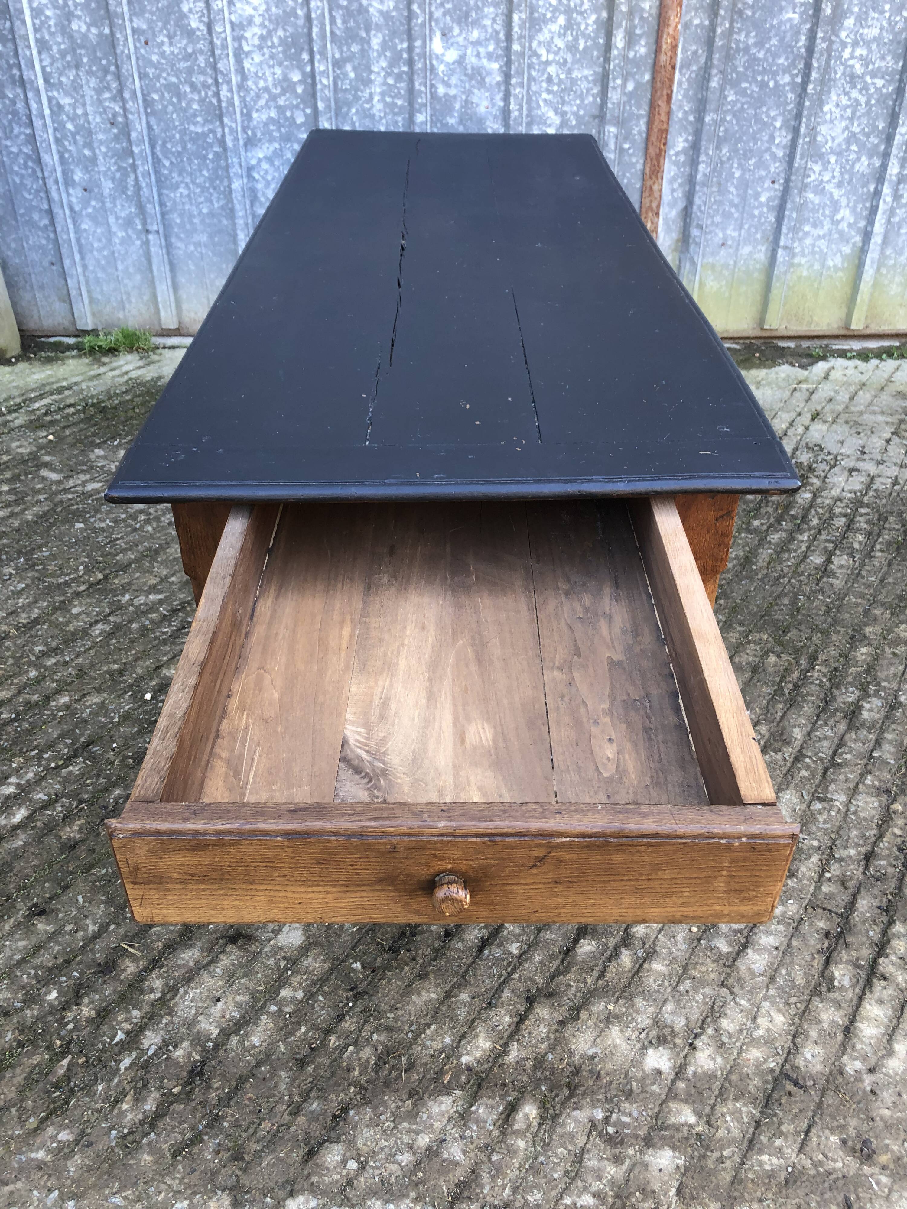 Antique oak farmhouse table with cat bar and 2 end drawers