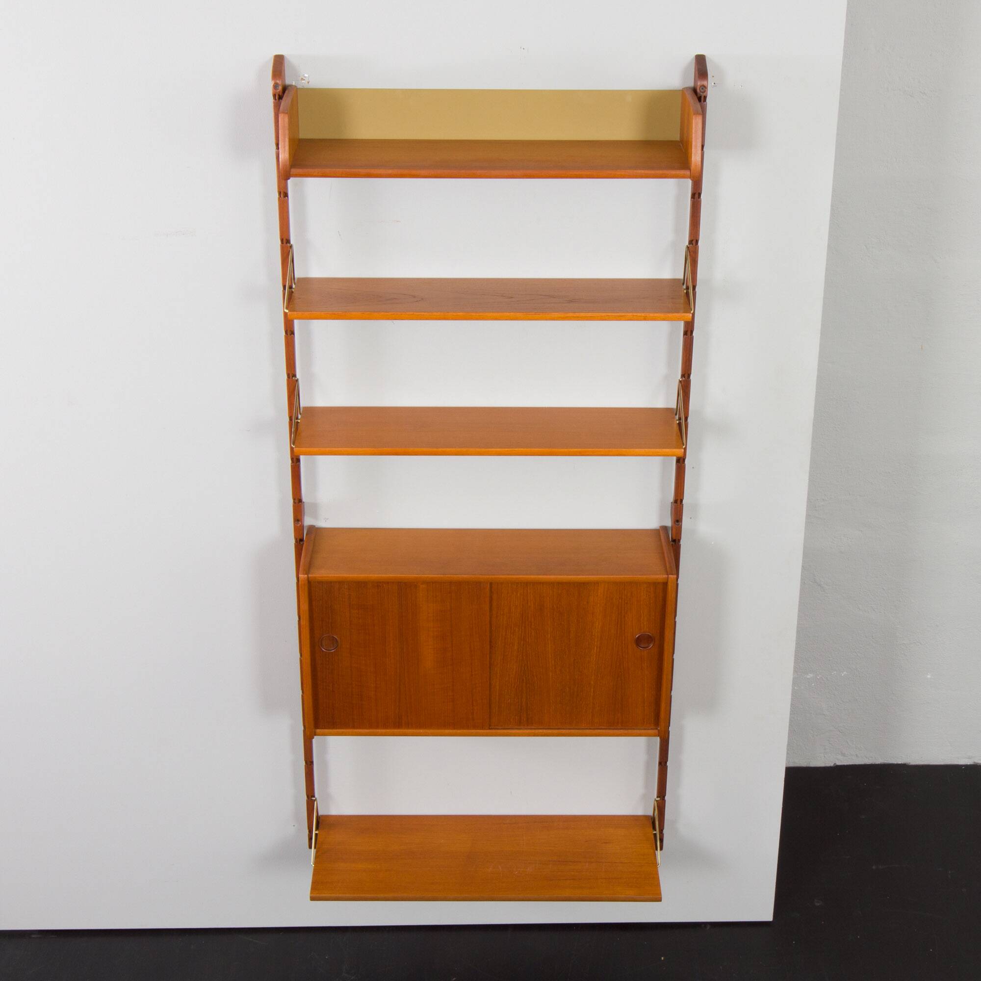 Scandinavian modern wall shelving system Ergo in teak by J. Texmon, Norway, 1960s