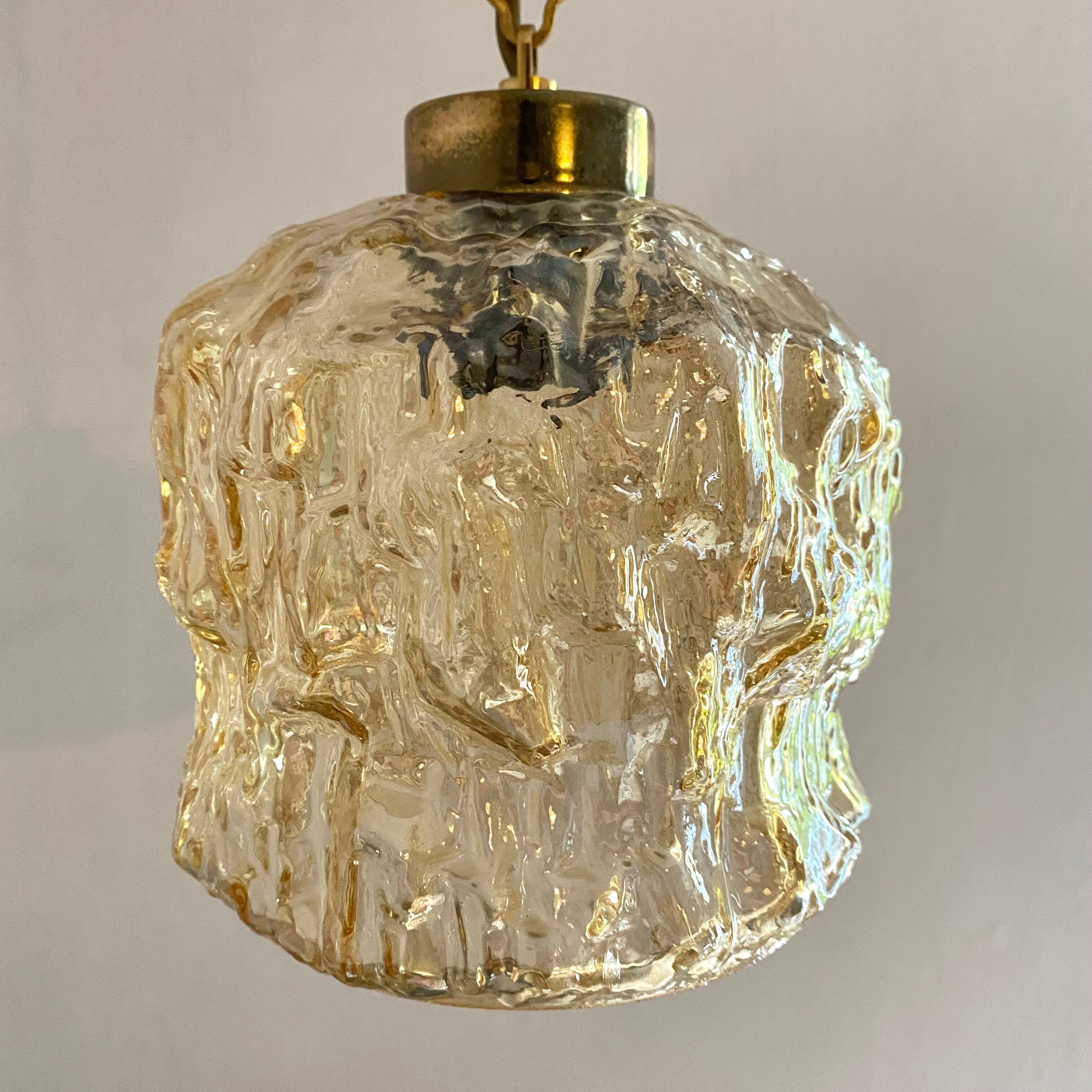 Pair of vintage amber glass pendant lamps