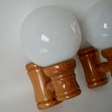 Pair of globe wall lights in pine and opaline from the 60s