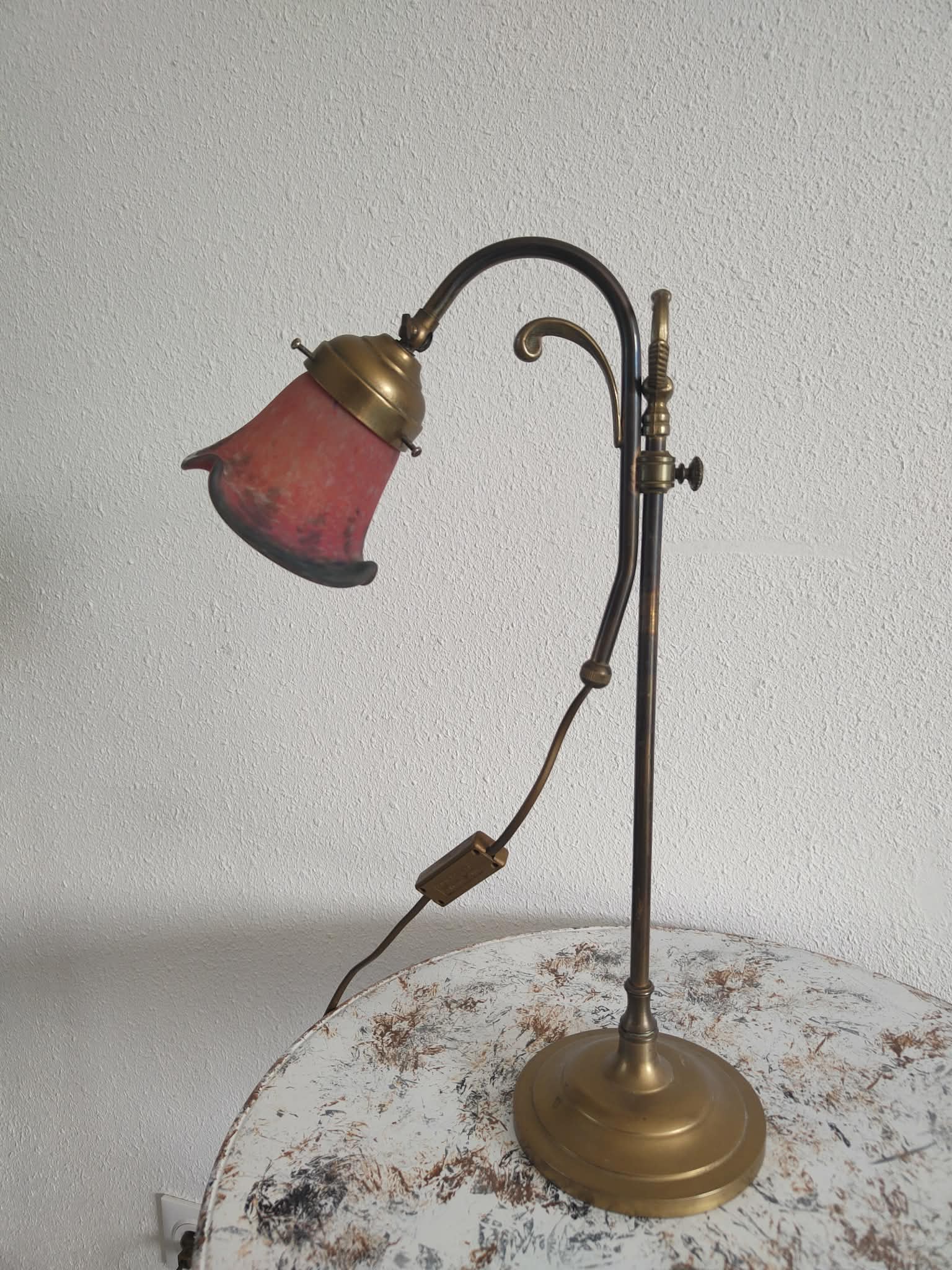 Brass articulated lamp with glass paste signed art of France.