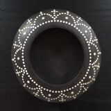 Black wood and mother-of-pearl pocket emptier