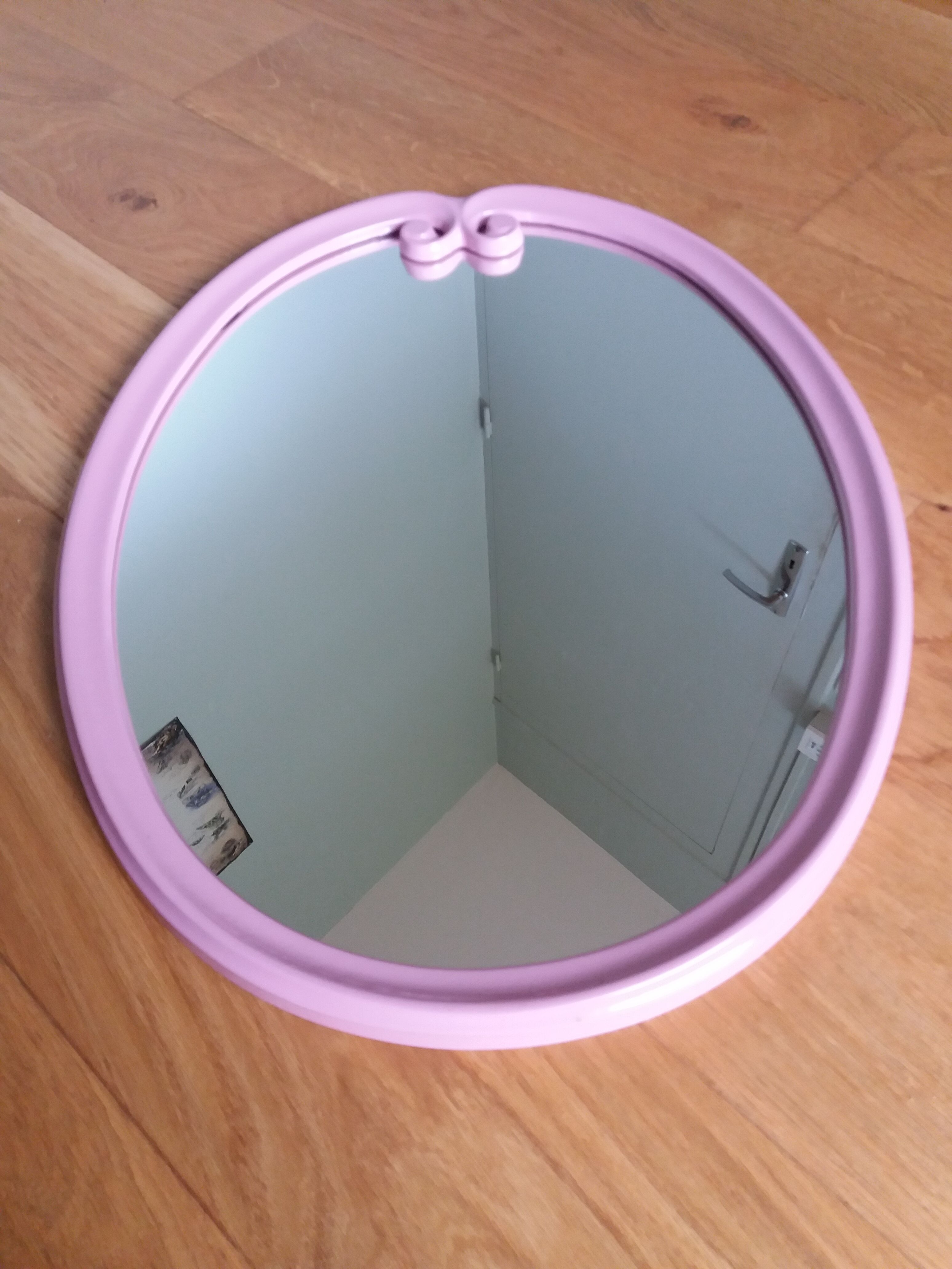 Oval mirror 49x39 frame in enamelled cast iron pink Art Deco