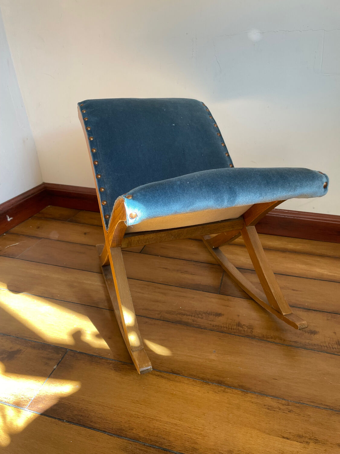 Rocking blue velvet footrest