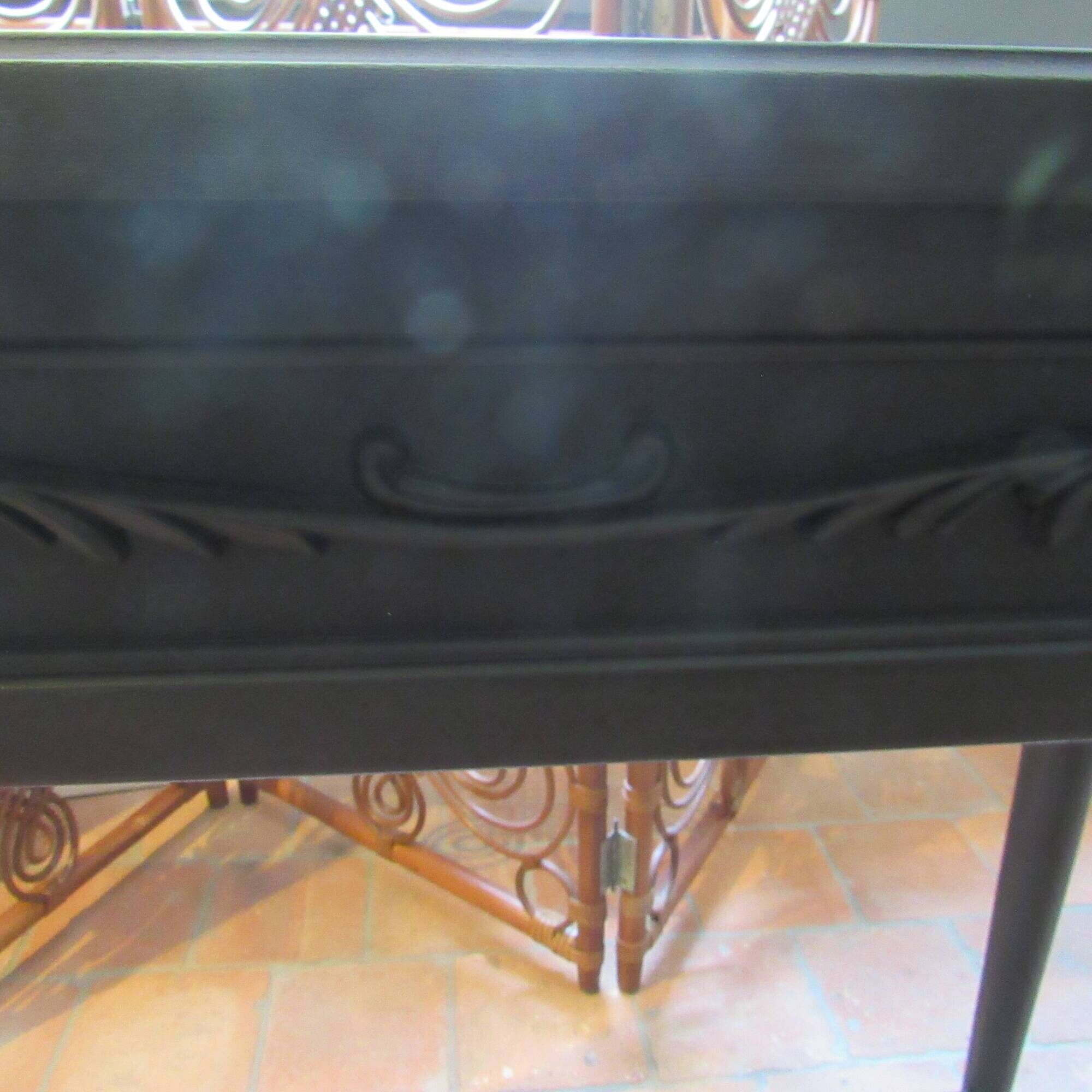 Vintage planter on wheels made of oak, repainted in black.