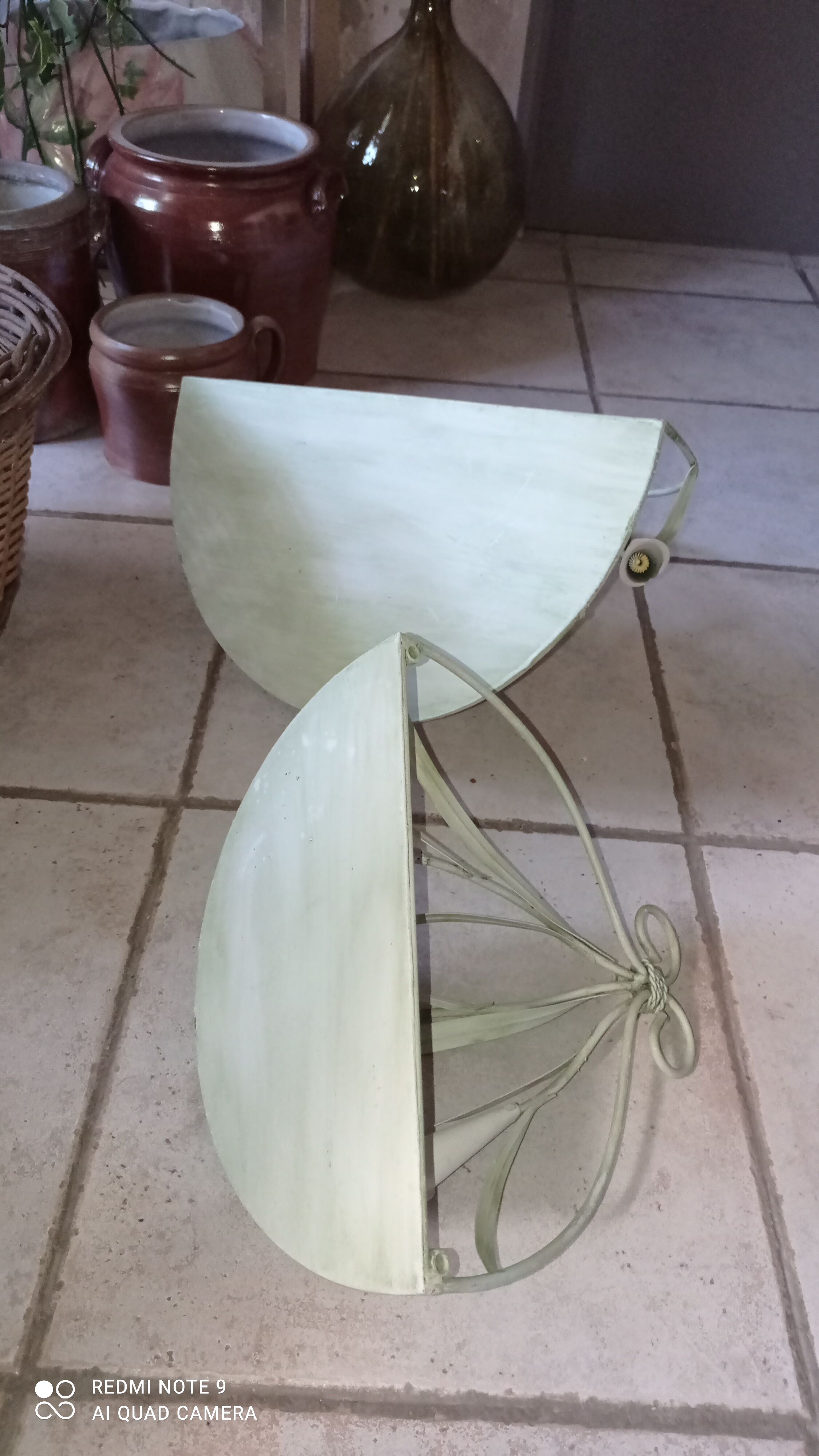 Duo of wrought iron shelves