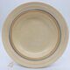 6 deep plates with fine blue and brown rim decorations.
