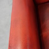 Set of 2 red-colored design armchairs made of sheepskin leather
