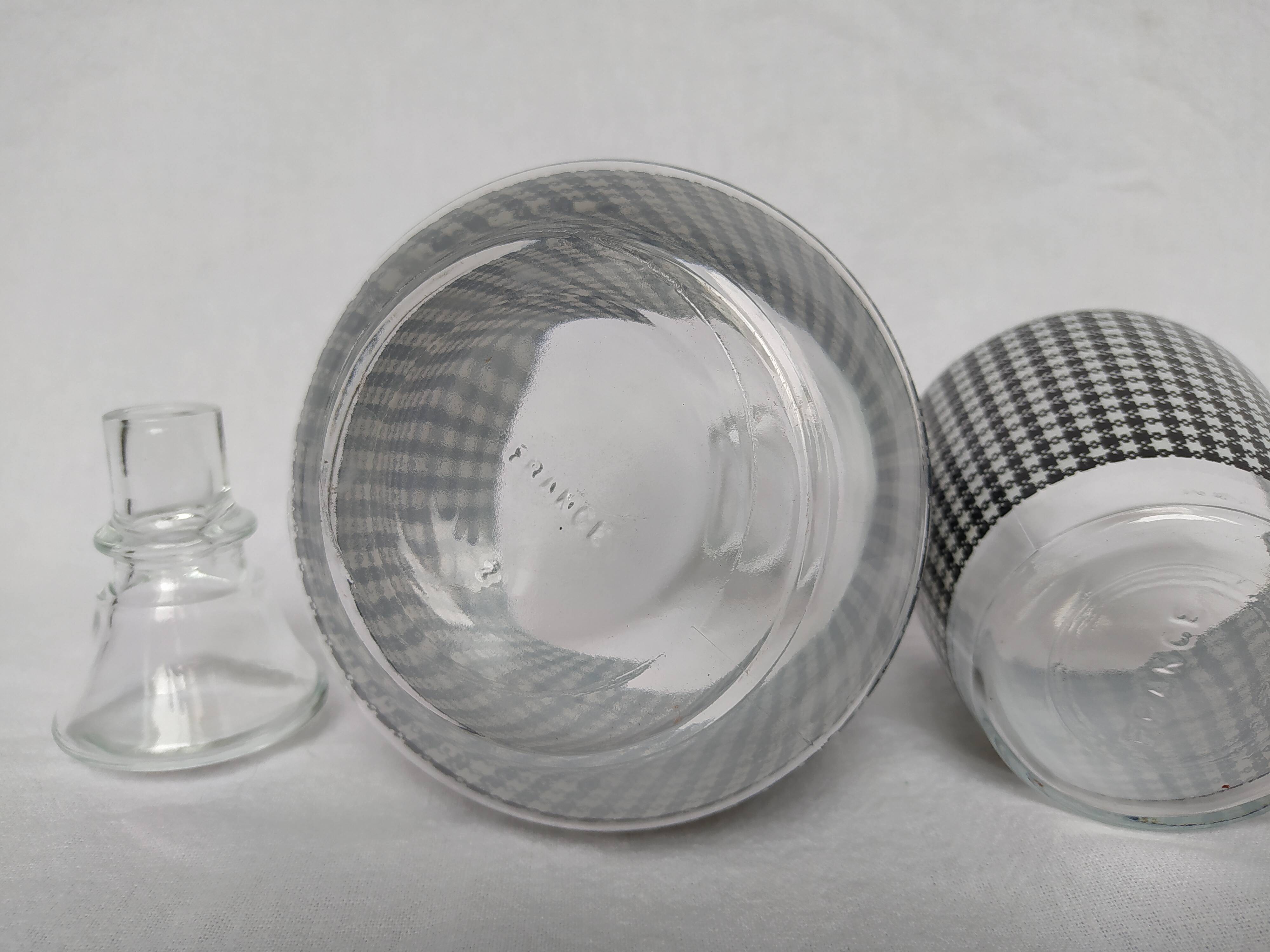 Set of 2 black and white houndstooth glass carafes from the Arques crystal factory. Rare.