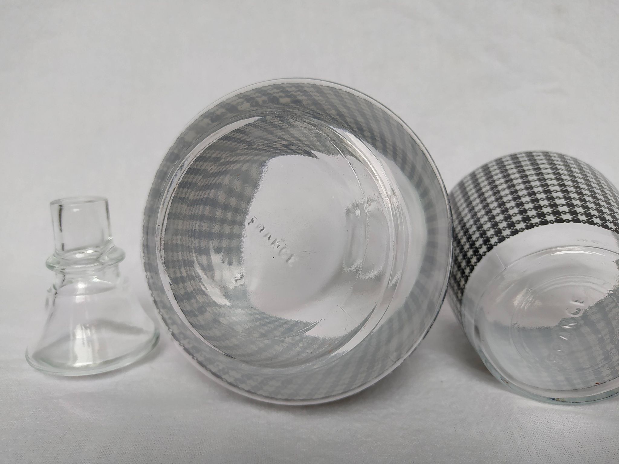 Set of 2 black and white houndstooth glass carafes from the Arques crystal factory. Rare.