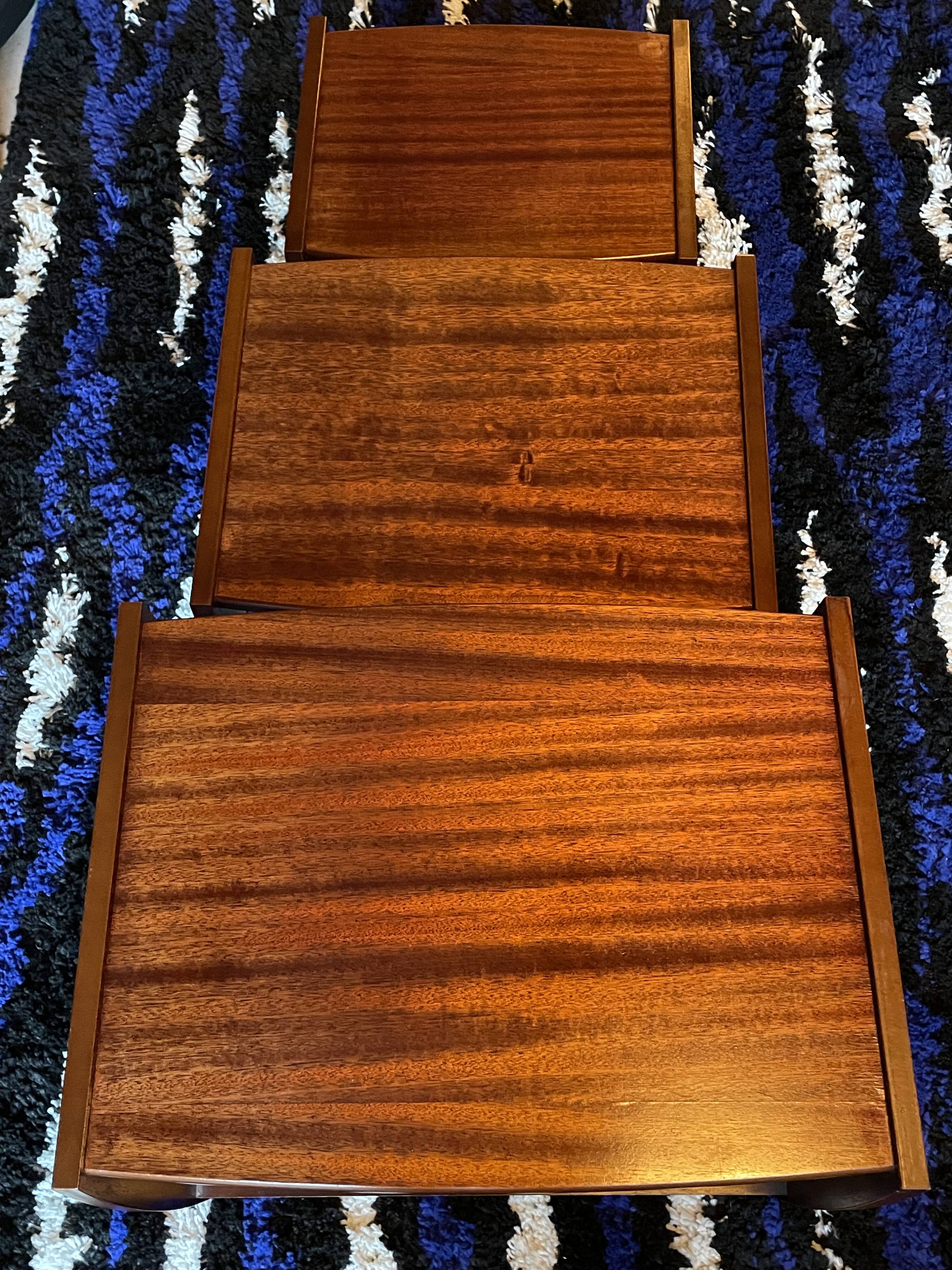 Set of three nesting coffee tables, 1970, dark wood.