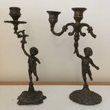 Pair of Cherub candlesticks.