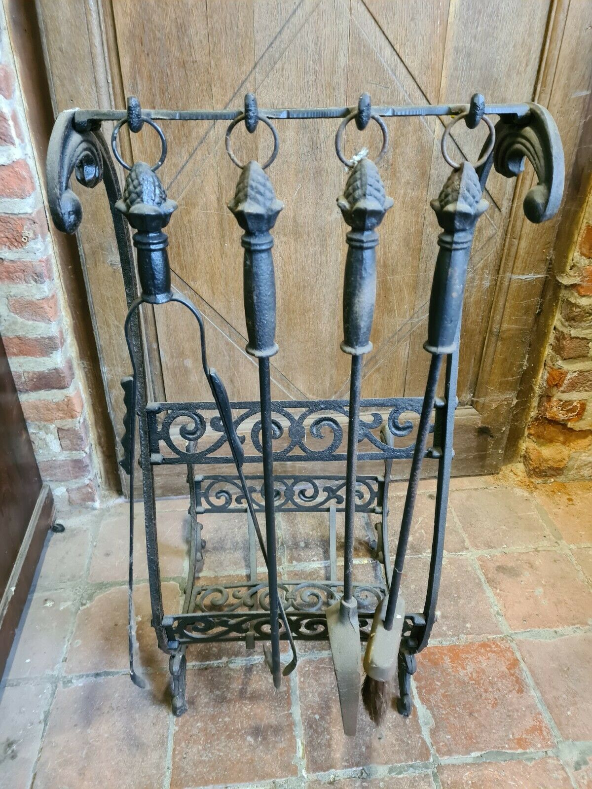 Fireplace, cast iron log holder