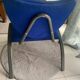 Black metal design armchair with blue fabric. 1980s.