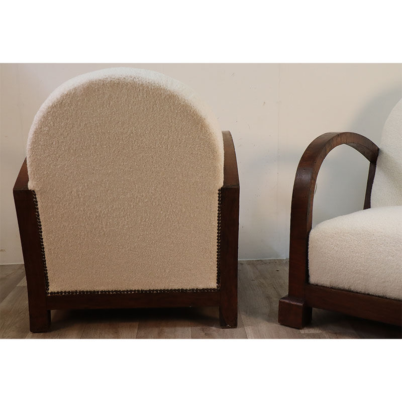 Pair of modernist armchairs in wood and buckle fabric, 1940