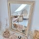 Miroir rectangle en bois et sculpté en bas-reliefs
