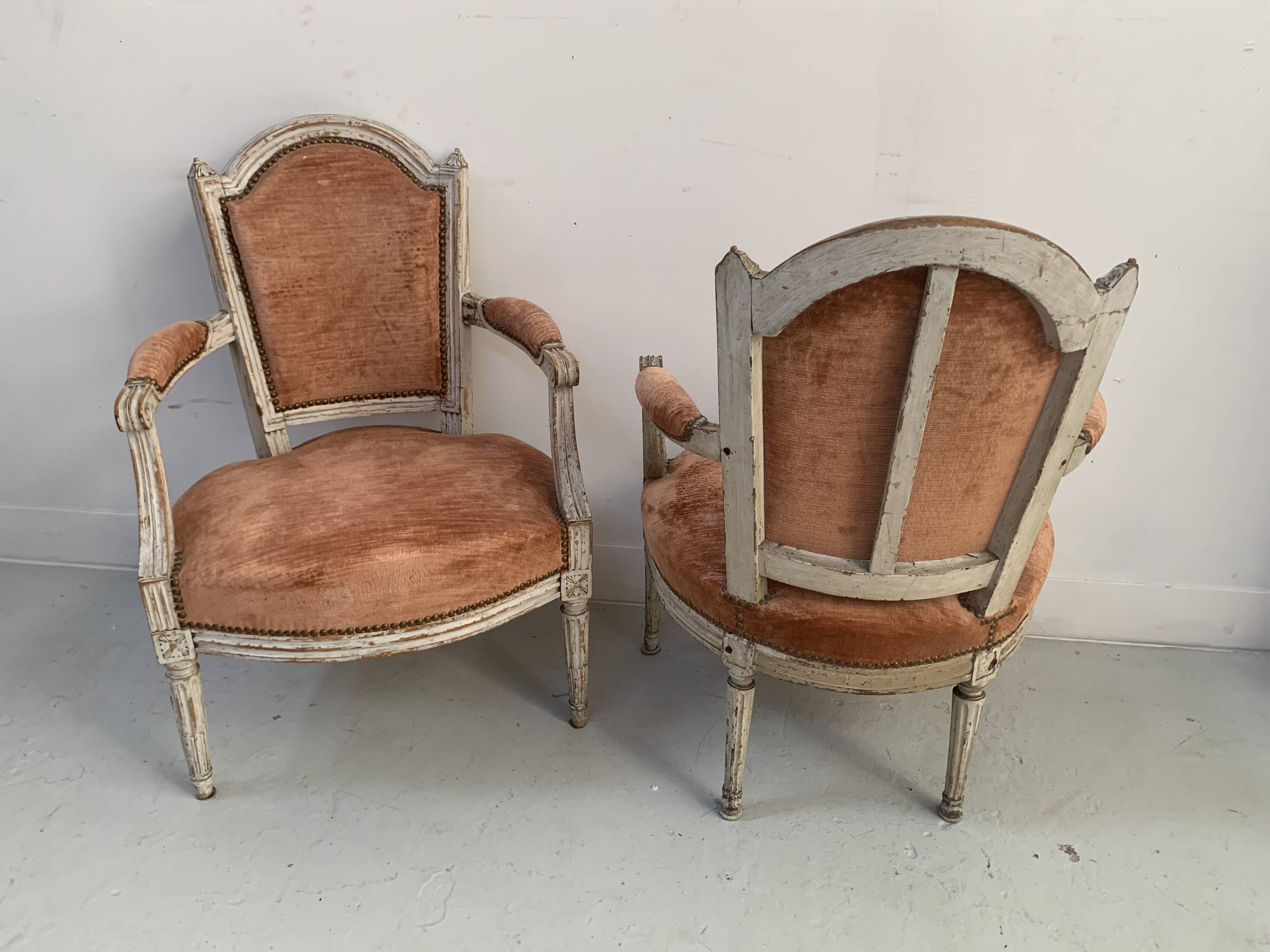 Pair of Louis XVI style armchairs in patinated beech, 19th century