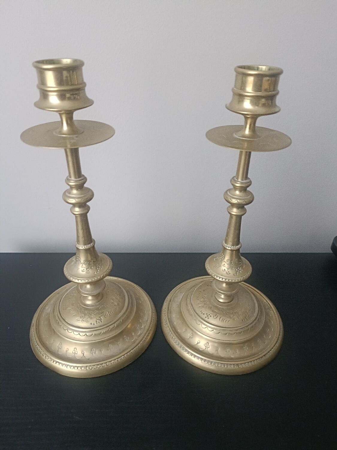 Pair of chiselled candlesticks
