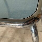 Blue formica table and its 4 chairs