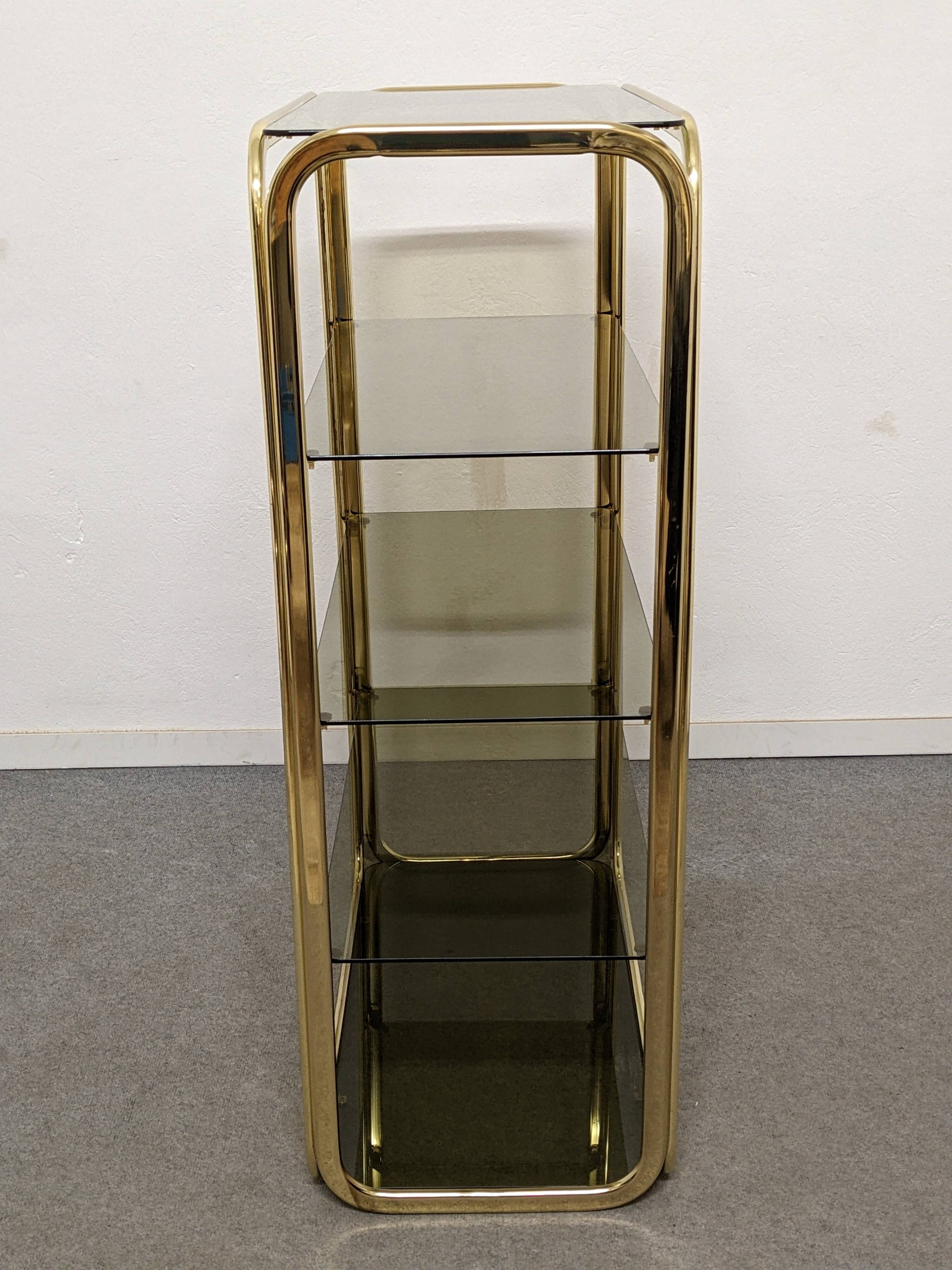 Hollywood Regency gilt metal and smoked glass shelf, Italy circa 1970