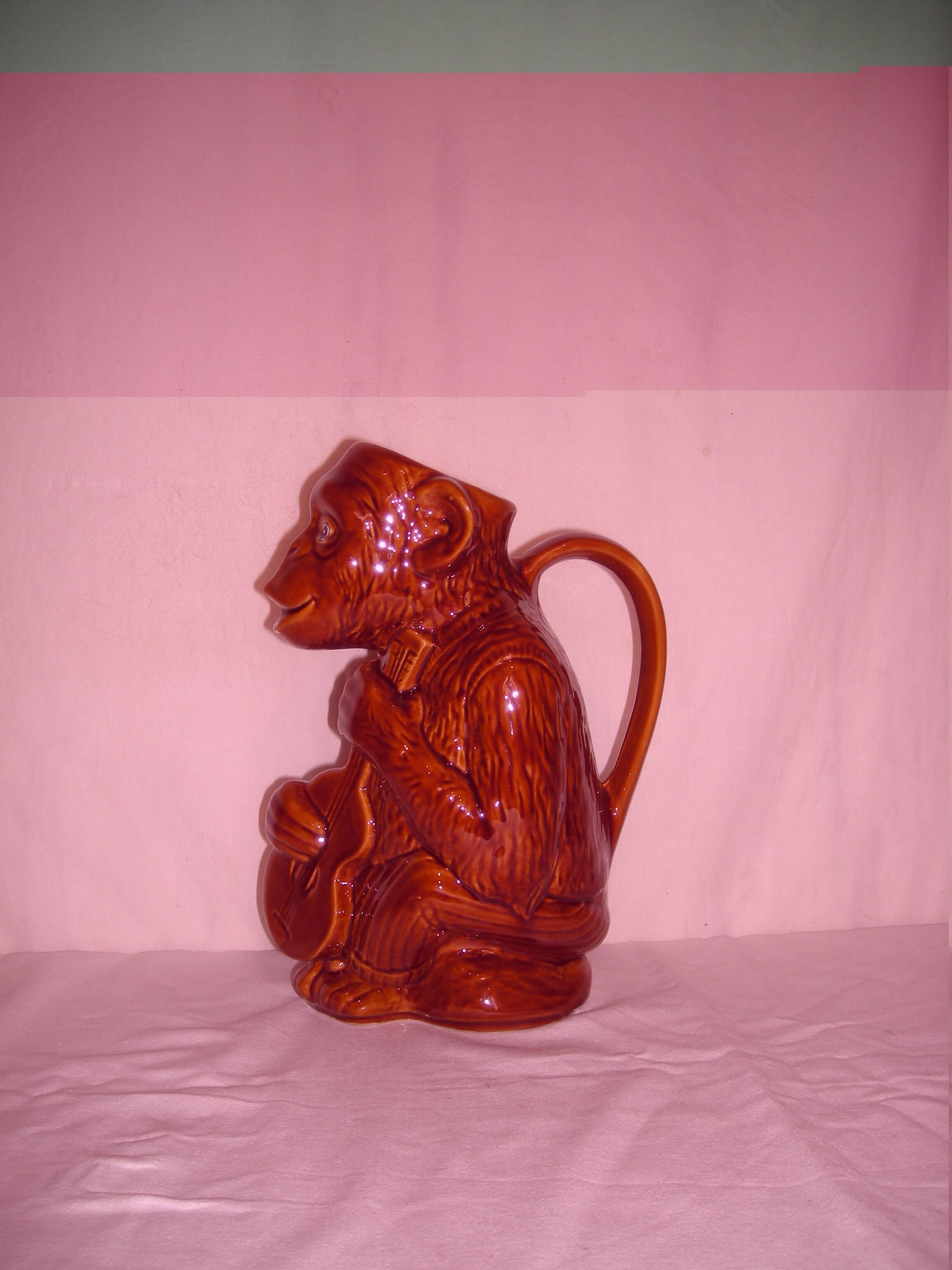 Chimpanzee pitcher; Monkey guitarist musician of the 60s