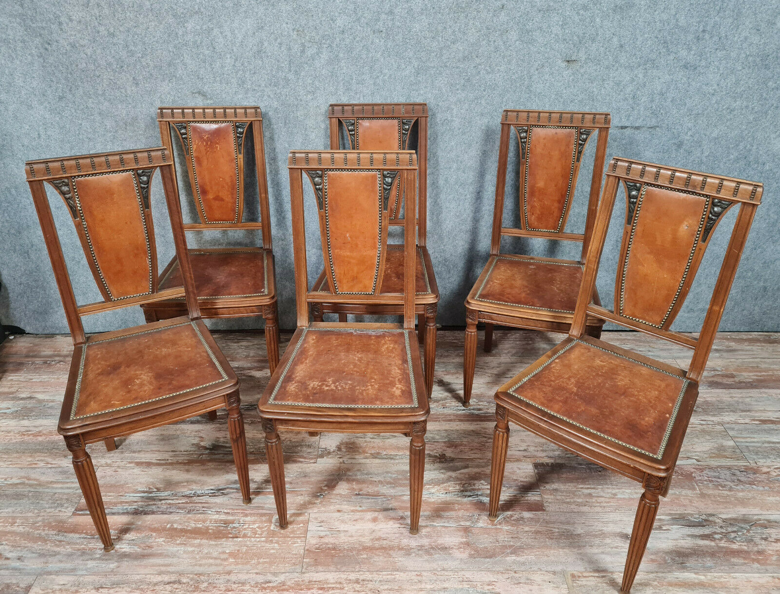 Series of 6 Art Deco period chairs in solid walnut with blonde patina