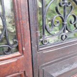 Porte d’entrée vitrée en chêne et grilles en fer, XIXème s.