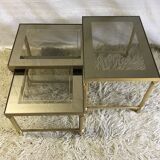 Brass and glass pull out tables 70