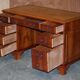 Vintage walnut desk with a leather top and two drawers.